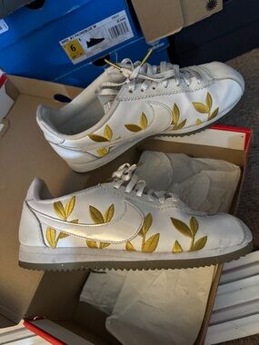 Nike Women’s Classic Cortez White Leather Sneakers with Gold Leaf Embroidery